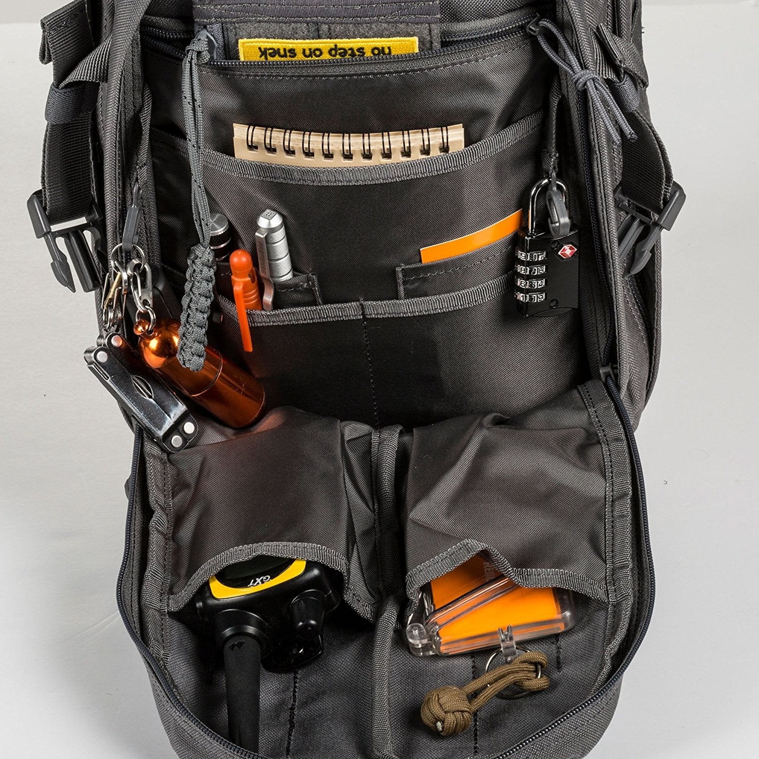 a back pack filled with tools and other items