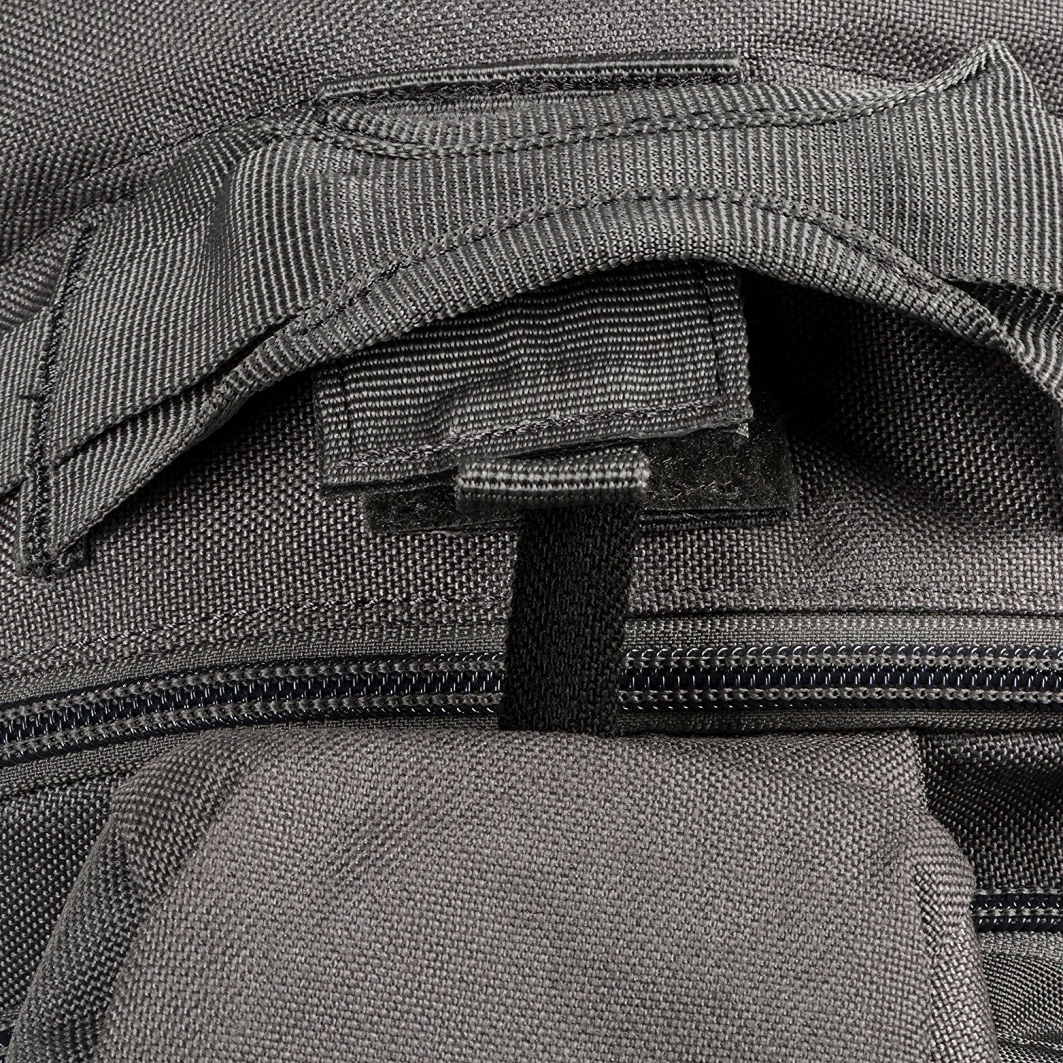 a close up of the zippers on a backpack