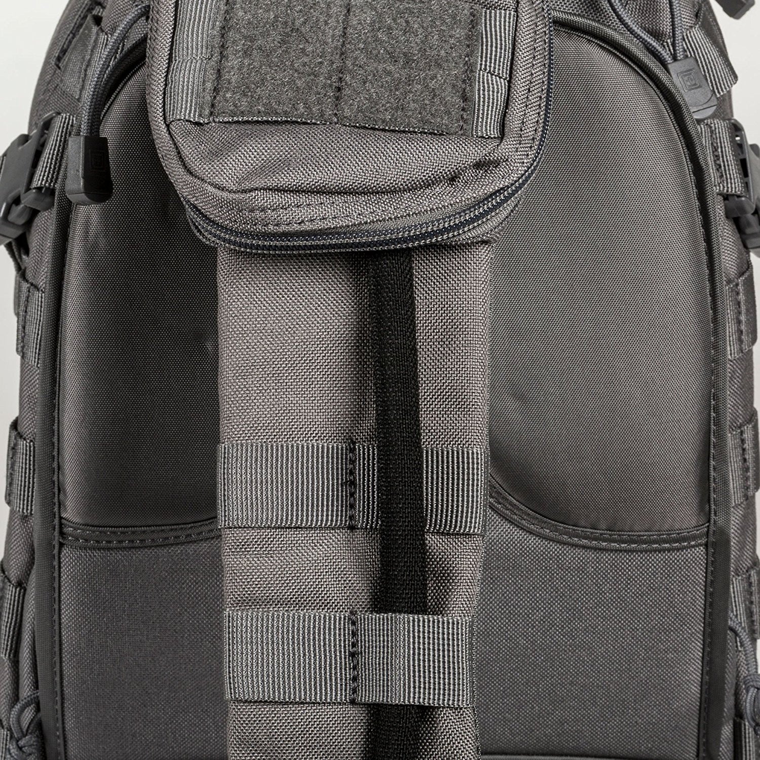 the back of a gray backpack with straps