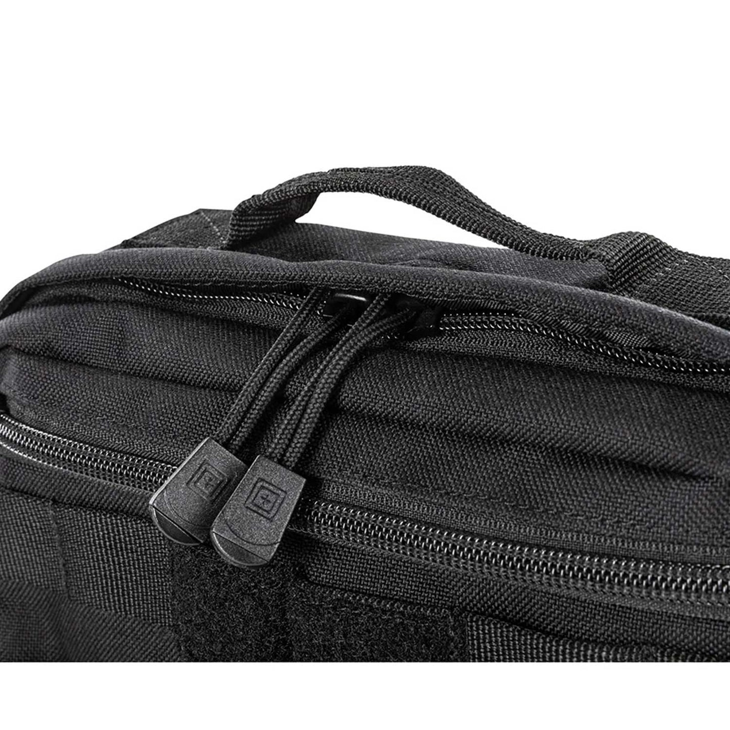 Detalle del cierre doble y asa superior reforzada de la mochila táctica 5.11 MOAB 3. Acceso rápido y cómodo para tus esenciales diarios.
