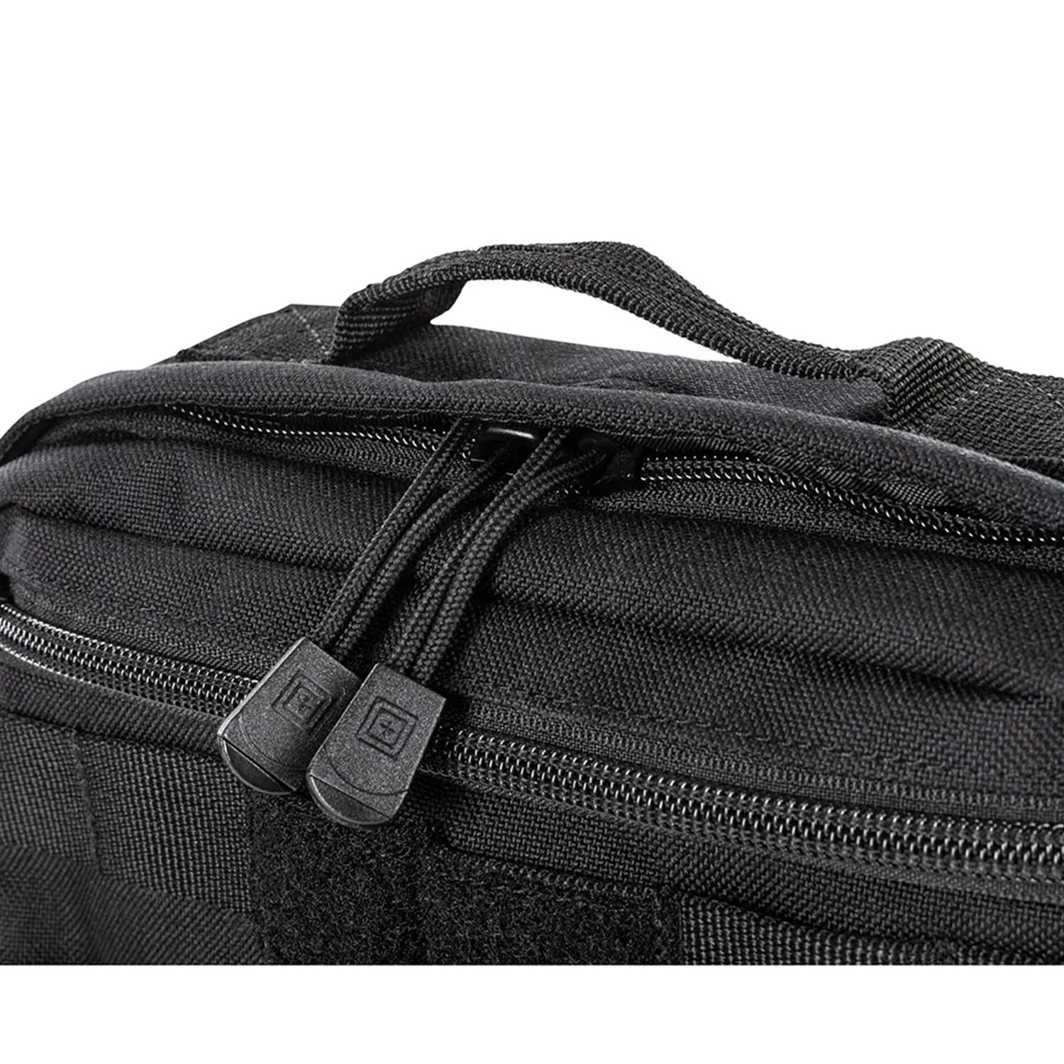 Detalle del cierre doble y asa superior reforzada de la mochila táctica 5.11 MOAB 3. Acceso rápido y cómodo para tus esenciales diarios.
