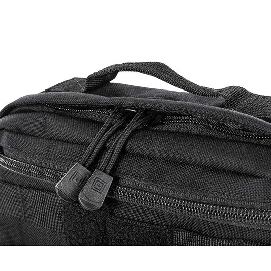 Detalle del cierre doble y asa superior reforzada de la mochila táctica 5.11 MOAB 3. Acceso rápido y cómodo para tus esenciales diarios.
