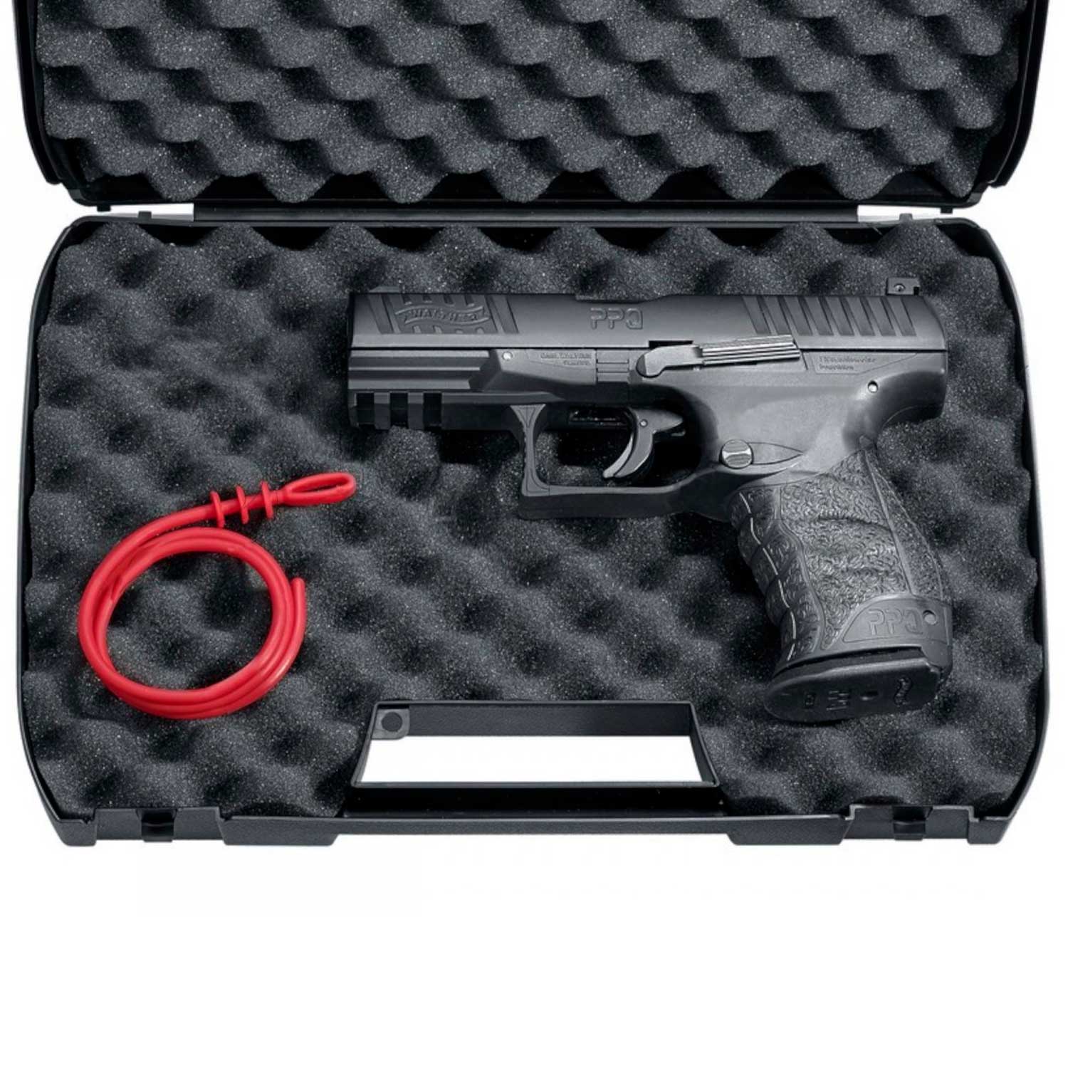 Pistola Walther PPQ T4E kit completo con estuche rígido abierto, esponja de protección, resorte de repuesto y accesorios organizados para transporte seguro.