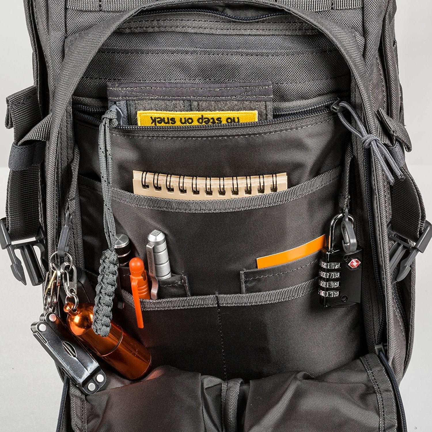 a backpack with a bunch of tools inside of it