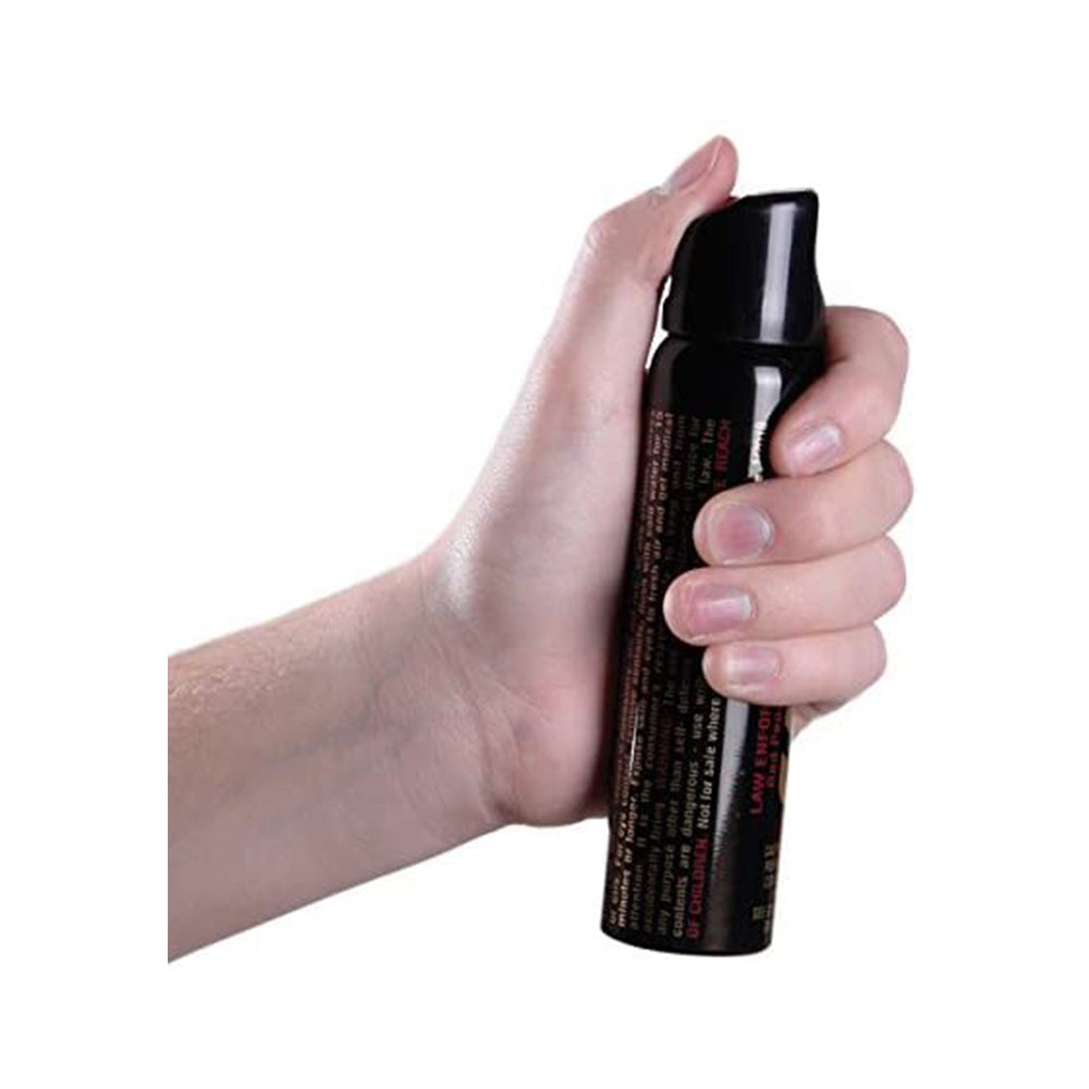 Gas Pimienta Sabre 122g Magnum Spray en mano